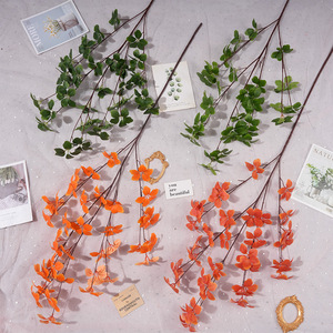 Branche de feuilles de Guanyin artificielles 30cm-100cm en plastique pour décoration intérieure et arrangements de mariage - Product Image 1