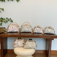 Cheongsam Hanfu sac à main à bandoulière nouveau Style Jacquard chinois estampage doré fleur de prunier bégonia artisanat sacs à bandoulière 2025 sac