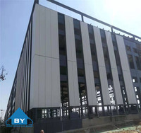 Entrepôt en structure acier imperméable sur mesure, grande portée, bâtiment industriel préfabriqué pour stockage et logistique, garantie 50 ans