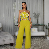 Ensemble décontracté d'été deux pièces pour femme : haut court bustier à motif floral et pantalon large uni