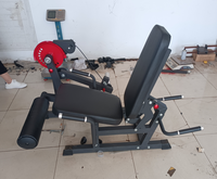 Machine d'extension assise Leg curl Entraîneur multifonctionnel Chaise d'entraînement pour jambes