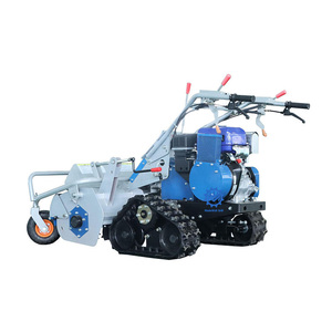 Tondeuse à fléaux sur chenilles bleue avec moteur et roues arrière pour l'entretien des pelouses - Product Image 5