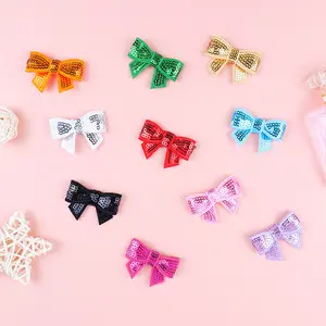 Toppe con paillettes ricamate con design bowknot di colori per abbigliamento per bambini