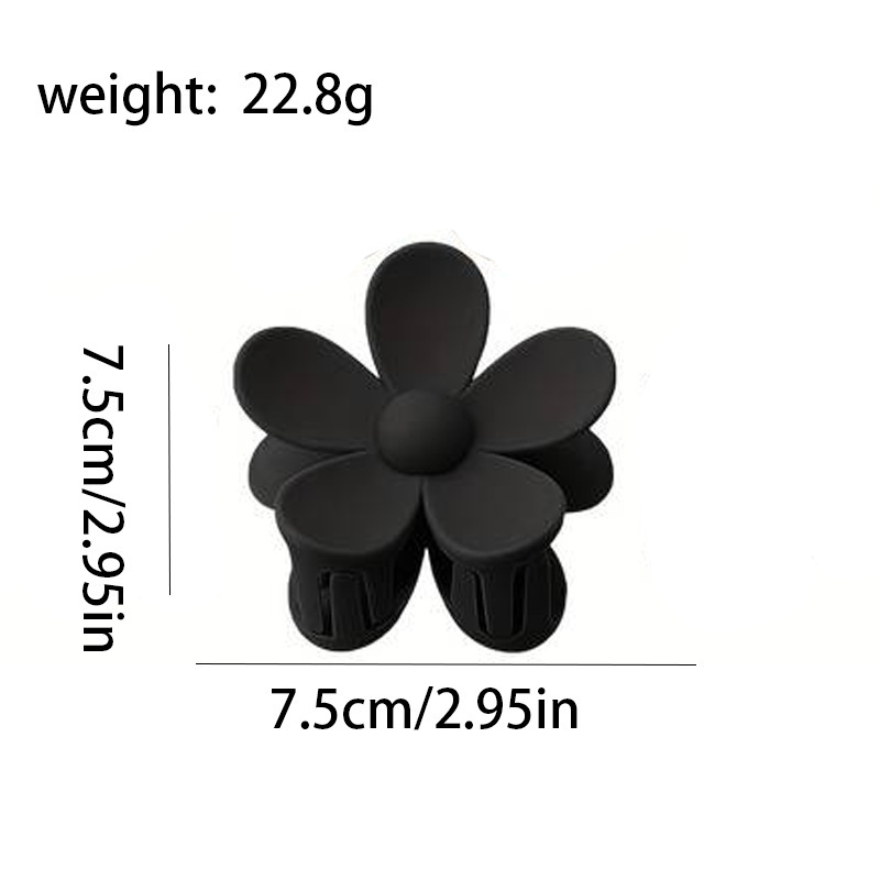 Black flower clip