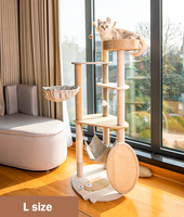 Arbre à chat multi-niveaux de style esthétique avec hamac, panier et perchoir, tour à chat haute avec poteaux en sisal et jouets à billes pour chats d'intérieur