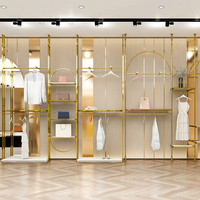 Porte-vêtements modulaire en acier inoxydable plaqué or PVD personnalisé pour boutique haut de gamme