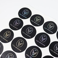 Autocollants personnalisés en papier cuivre avec impression noire et feuille holographique argentée pour bouteilles en verre