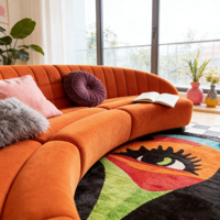 Canapé modulaire incurvé moderne en velours orange avec capitonnage cannelé pour salon