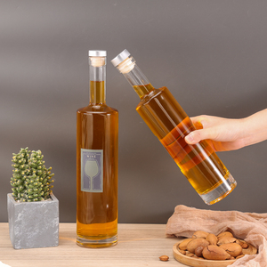 Conteneur de vin de stockage de saké de <span class=keywords><strong>cidre</strong></span> de <span class=keywords><strong>gin</strong></span> clair 500/750ml bouteilles en verre rondes de vodka hydromel de brandy de boisson d'alcool de boisson d'alcool avec couvercle en liège - Product Image 5