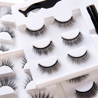 Fournisseur de gros OEM ODM ACCEPTÉ Cils en cheveux synthétiques moelleux de 25mm ensemble avec eyeliner et pince à épiler
