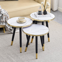 Table basse circulaire moderne combinée pour petits appartements, idéale pour les zones de réception haut de gamme et les salons simples