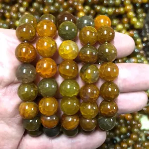 Braccialetto di pietra vulcanica occhio di tigre all'ingrosso braccialetto di coppia di perle di occhio di tigre giallo Gallstone nero