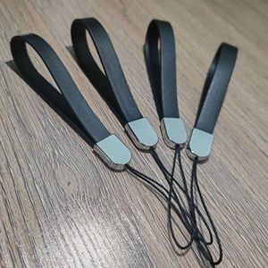 สายคล้องโทรศัพท์หนัง PU หัวเข็มขัดโลหะสีดำ พวงกุญแจพกพาสำหรับโทรศัพท์มือถือ หูฟังบลูทูธ ไดรฟ์ USB ขวดน้ำ - Product Image 1