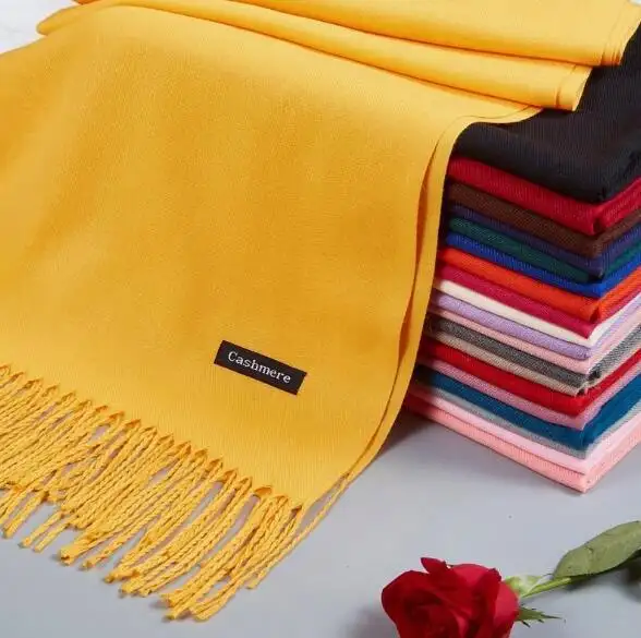 Signore di modo di Colore Puro OEM 70*190 di Lusso Hijab Dello Scialle di Inverno di Pashmina Sciarpa Con La Nappa