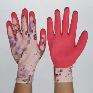 Luvas de segurança com acabamento em espuma revestida de palma de poliéster e látex rosa sem costura Suncend flor 13 calibre