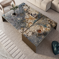 Table basse minimaliste italienne de luxe légère, ronde, personnalisable en couleur, en pierre frittée, avec structure en acier inoxydable pour salon
