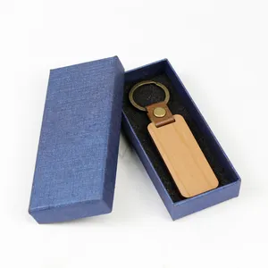 Portachiavi classico in legno PU più venduto regalo caldo di natale intaglio testo modello personalizzato