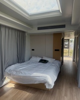 Cabine d'hôtel mobile de luxe en acier étanche avec structure en acier, alimentation solaire et design moderne