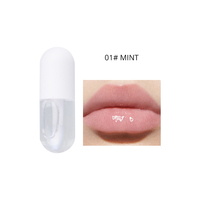 Brillant à lèvres plus dodu avec logo personnalisé en forme de capsule mignonne vente en gros Brillant à lèvres transparent à l'huile pour les lèvres en gelée de marque privée