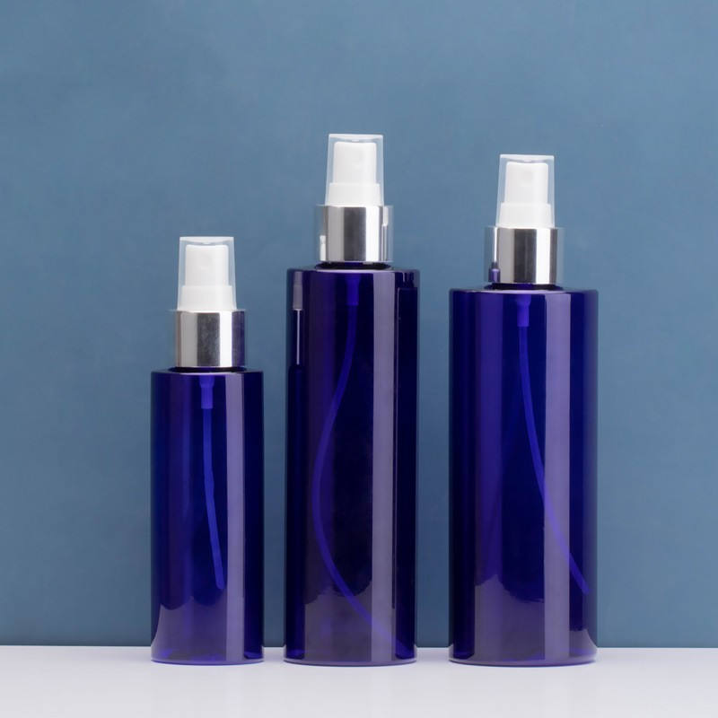 Blue bottle with aluminum sprayer