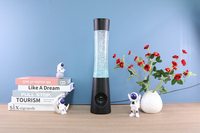 Détendez-vous et laissez-vous transporter par une lampe liquide RGB hypnotique, une veilleuse scintillante avec haut-parleur Bluetooth