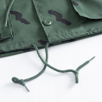 Uniforme d'entraînement tactique de sécurité tanzanien en camouflage vert Ensemble veste et pantalon de combat personnalisés pour des conditions de terrain difficiles