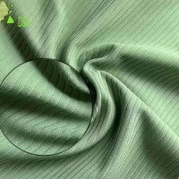 Gran oferta 220GSM 80% nailon 20% Spandex tela de Yoga acanalada tejido texturizado de alta elasticidad para ropa deportiva Yogawear