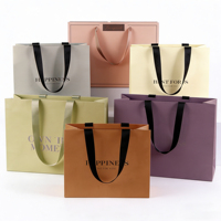Sacs en papier personnalisés imprimés en couleur, durables et écologiques, design de luxe à poignée pour l'emballage de vêtements et le shopping