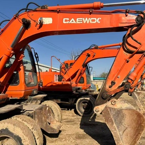 Excavatrice sur pneus d'occasion DOOSAN DH130W 13 tonnes, modèle 2015, moteur et boîte de vitesses inclus, rapport fourni - Product Image 2