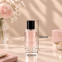 Vente en gros de flacons atomiseurs de parfum en verre transparent épais de 50 ml, design à épaule ronde, impression personnalisée pour l'emballage cosmétique