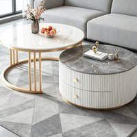 Table basse moderne noire à design rond avec rangement pour salon