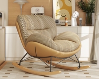 Fauteuil à bascule moderne en tissu texturé avec design ergonomique et structure métallique, chaise longue confortable pour salon ou chambre d'enfant