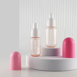 लोशन आवश्यक तेल बाल तेल प्लास्टिक कंटेनर के लिए गुलाबी कैप्सूल आकार की कॉस्मेटिक प्लास्टिक पैकेजिंग बोतलें