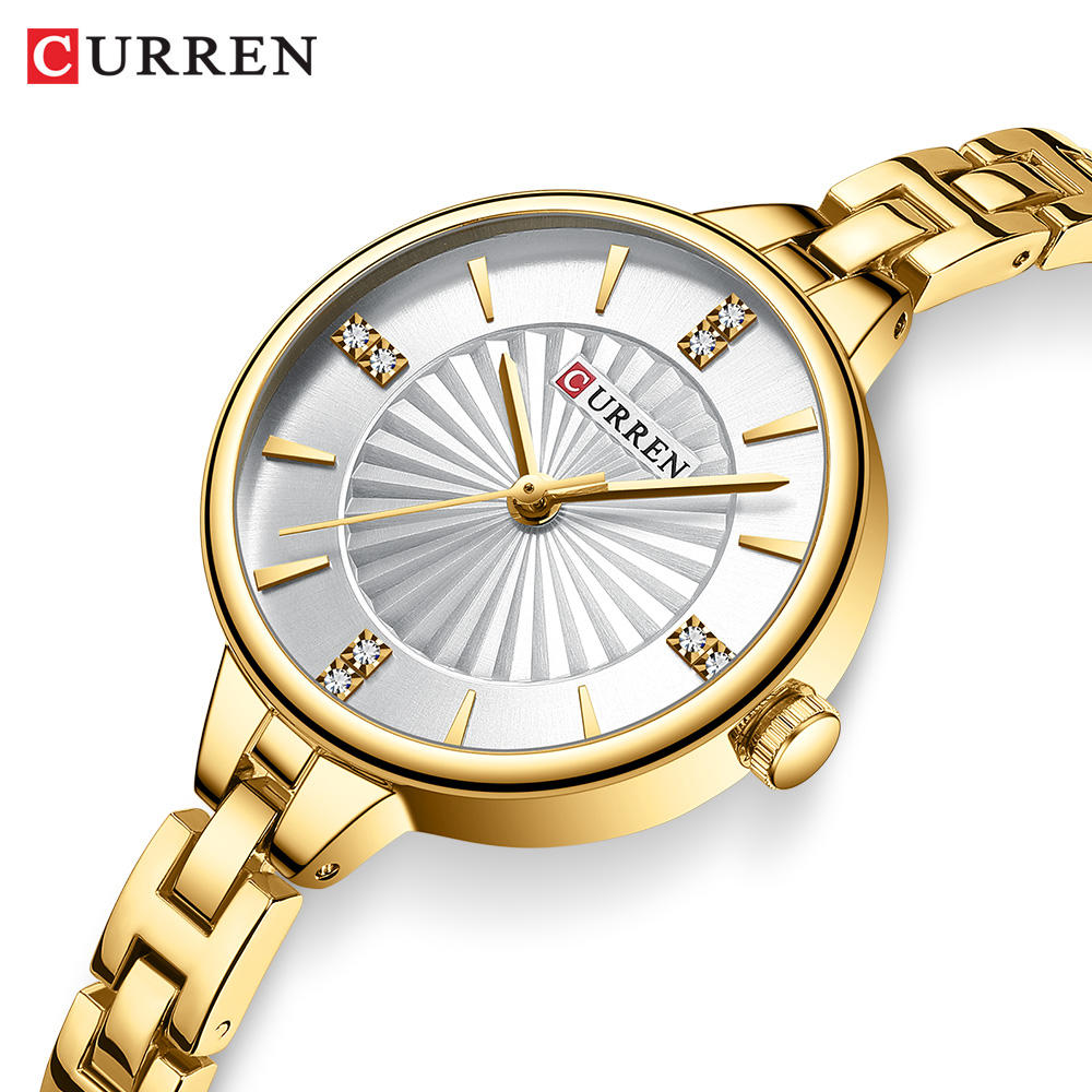 White dial gold strap