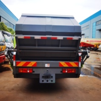 Camion de collecte des déchets compactés à benne triangulaire de 10 mètres cubes Dongfeng Huashen T3