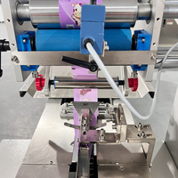 Multifunktionale Hochgeschwindigkeits-Minzbonbon-Horizontalverpackungsmaschine mit Zuführschale Kissenförmige Bonbonverpackungsmaschine