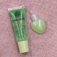OEM ODM OBM Private Label 24 stuks Hydraterende Hartvormig Liefdesdesign Nieuwe Fruit Charm Transparante Kleurloze Lip Olie
