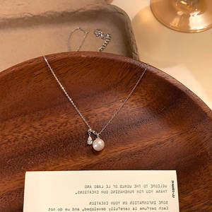 สร้อยคอพู่มุกแบบเรียบง่ายสำหรับผู้หญิง หรูหรา น้ำหนักเบา ดีไซน์หรูหรา เข้าได้กับทุกชุด สร้อยคอคล้องคอ สร้อยคอสำหรับใส่กับเสื้อสเวตเตอร์ - Product Image 2