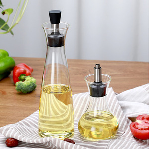 Juego de botellas de aceite de vidrio con diseño a prueba de fugas para uso en la cocina, tapa de plástico de forma redonda en tamaños pequeños y grandes - Product Image 1