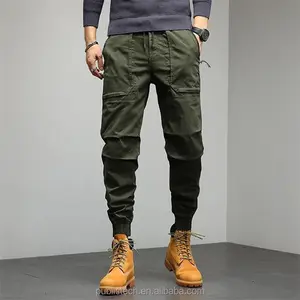 Pantalones de hombre ajustados personalizados impermeables para exteriores pantalones de nailon ajustados ligeros