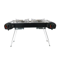 Haute qualité Portable Double brûleur à gaz Butane cuisinière Mini fonte Camping table de cuisson pour une utilisation en voiture Offre Spéciale cuisinière à gaz Portable