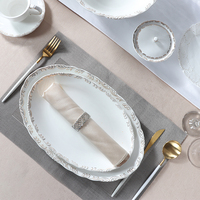 Service de table royal vaisselle en céramique fabriquée en Chine assiettes à dîner végétales bols nordiques service de table de luxe vaisselle blanche et argentée
