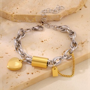 Bracelet de luxe bicolore en acier inoxydable, maillons dorés et argentés avec <span class=keywords><strong>plaque</strong></span> ovale en zircon cubique, étanche et anti-ternissement - Product Image 1