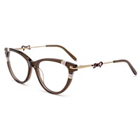 Monturas ópticas hechas a mano de lujo Retro ojo de gato acetato y anteojos de Metal diseño de arco moderno para mujer