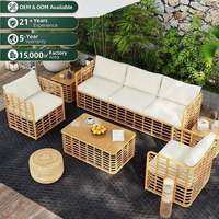 Ensemble de salon de jardin en rotin de style nordique avec table basse, structure métallique, chaises décontractées imperméables et résistantes aux UV pour villas et jardins
