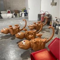 Table basse personnalisée en fibre de verre FRP avec personnage de dessin animé, grande sculpture de chat orange, table d'appoint pour promotion de marque et hôtels