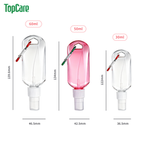 Vente en gros de flacons pulvérisateurs en plastique de 30 ml, 50 ml, 60 ml, porte-clés, vaporisateur de désinfectant pour les mains portable pour les voyages, avec mousqueton, logo personnalisé