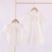Combinaison pour bébé fille avec col Peter Pan, manches courtes bouffantes, bordure en dentelle, douce et respirante, combinaison quotidienne pour bébé, robe blanche d'été pour filles