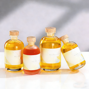 Bouteilles d'alcool en <span class=keywords><strong>verre</strong></span> transparent 100ml 250ml 500ml Couvercles en liège pour le brassage à la maison pour les boissons <span class=keywords><strong>Limoncello</strong></span> Liqueurs Alcools Approvisionnement en vrac - Product Image 4