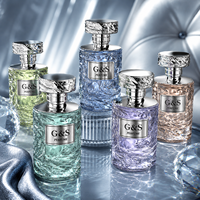 Botol Parfum Kosong Kaca Bentuk Bulat dengan Pompa Semprot Harga Pabrik 50ml/100ml, Dapat Disesuaikan dengan Sablon dan Kotak Kemasan Kosmetik
